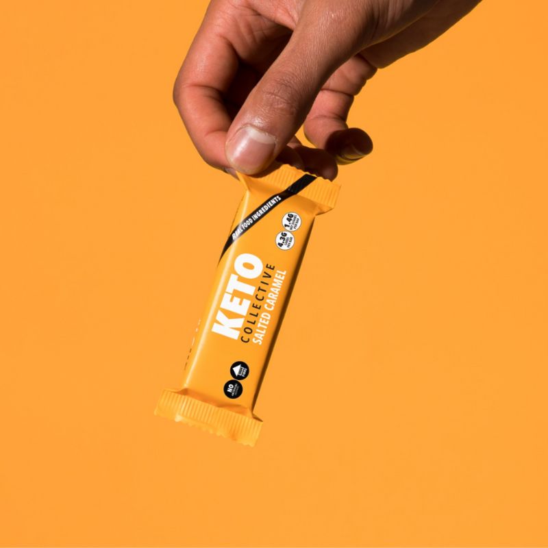 salted caramel keto bar orange background